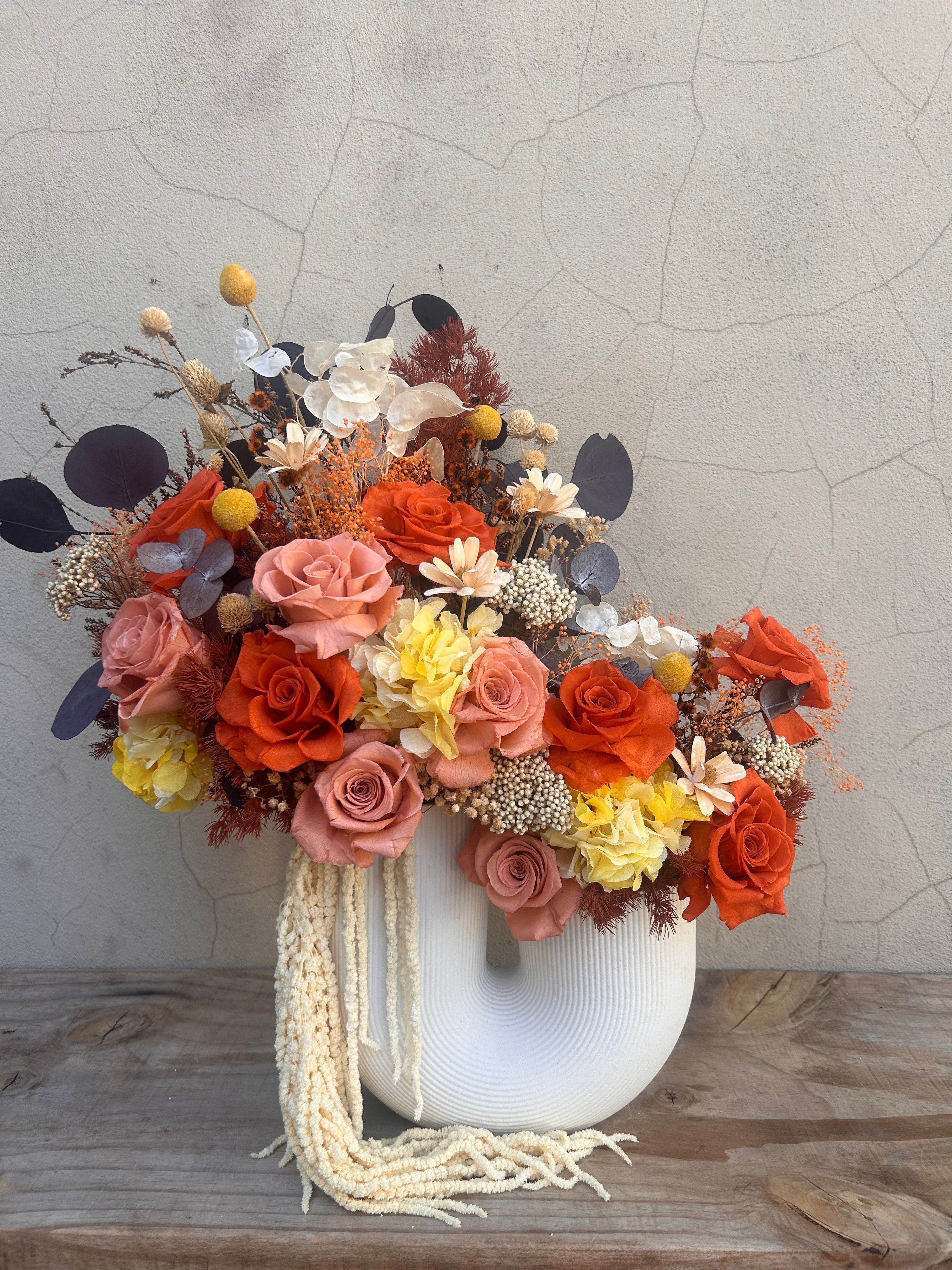 Amber Tangerine dried floral arrangement in burnt orange tones, styled for modern home decor