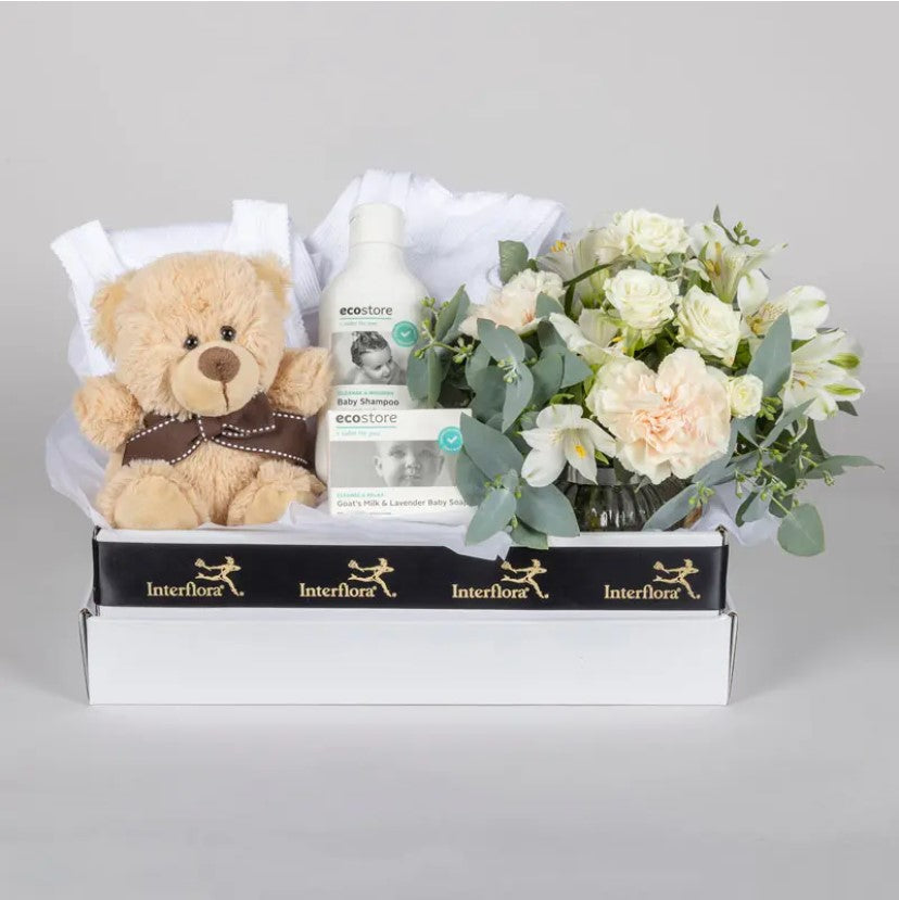 Baby gift hamper with organic cotton onesie and plush toy — Perth same-day delivery