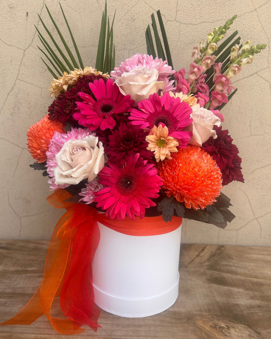Cherry Spice flower box with maroon, orange and pink blooms – The Flower Boutique Perth