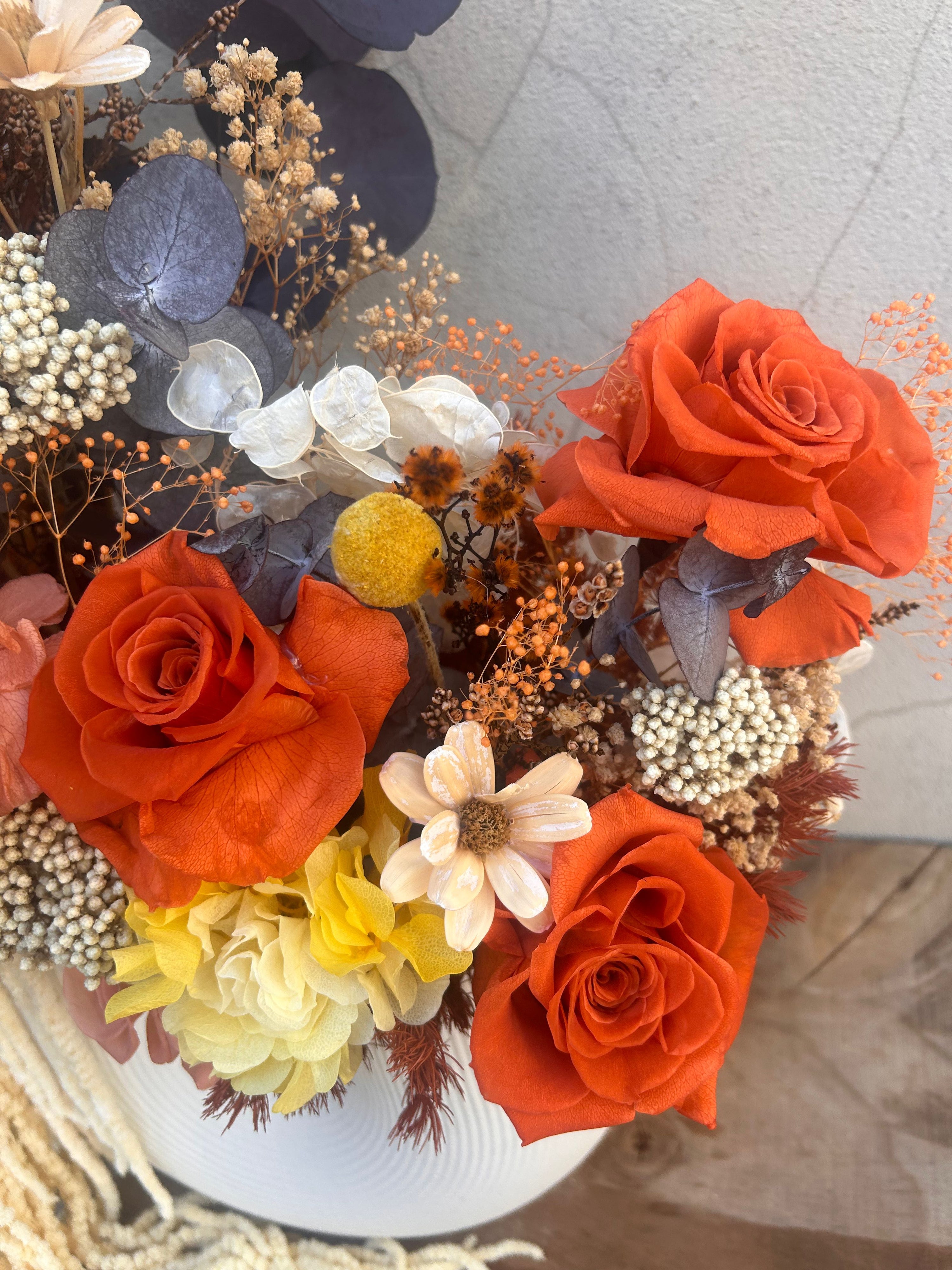 Amber Tangerine dried floral design featuring warm burnt orange hues for shelf or table decor
