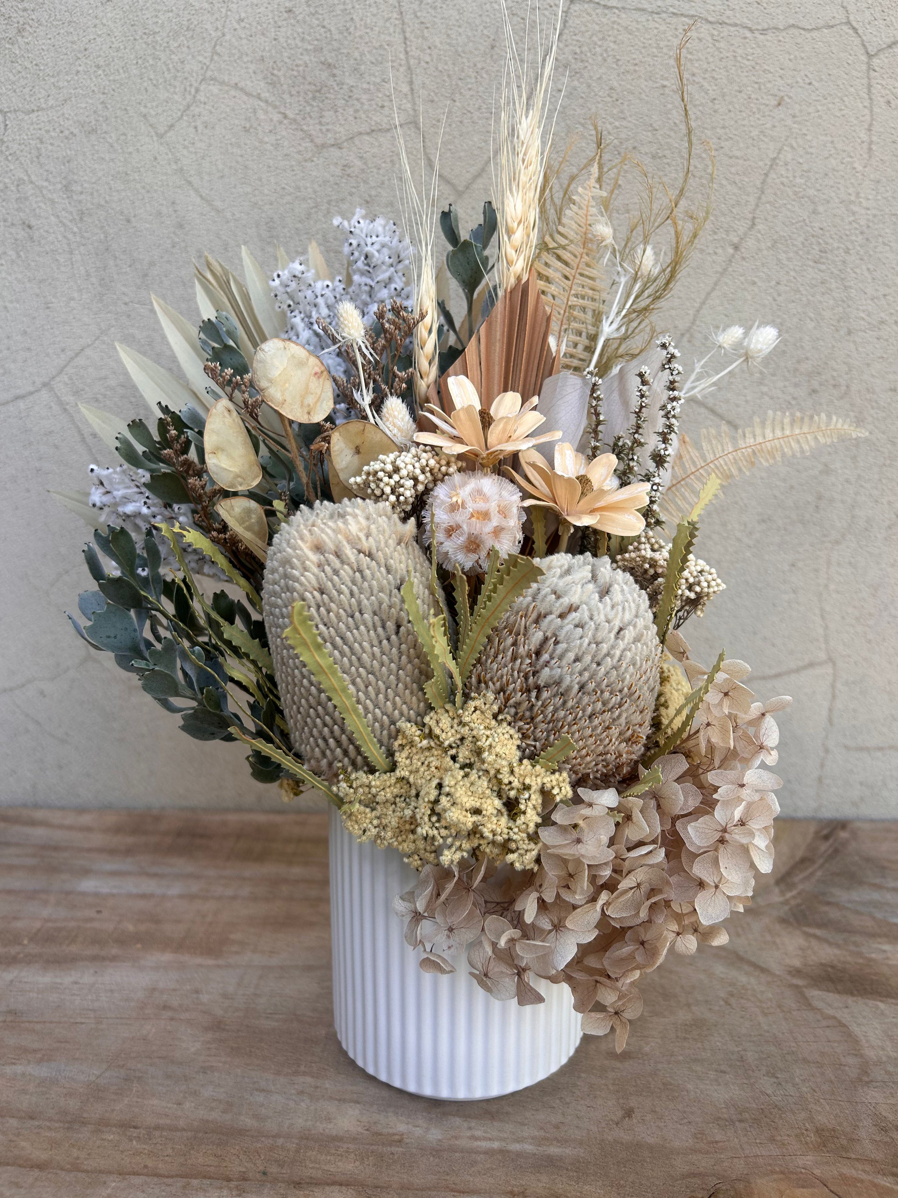 Earthen dried floral arrangement with banksia Perth florist