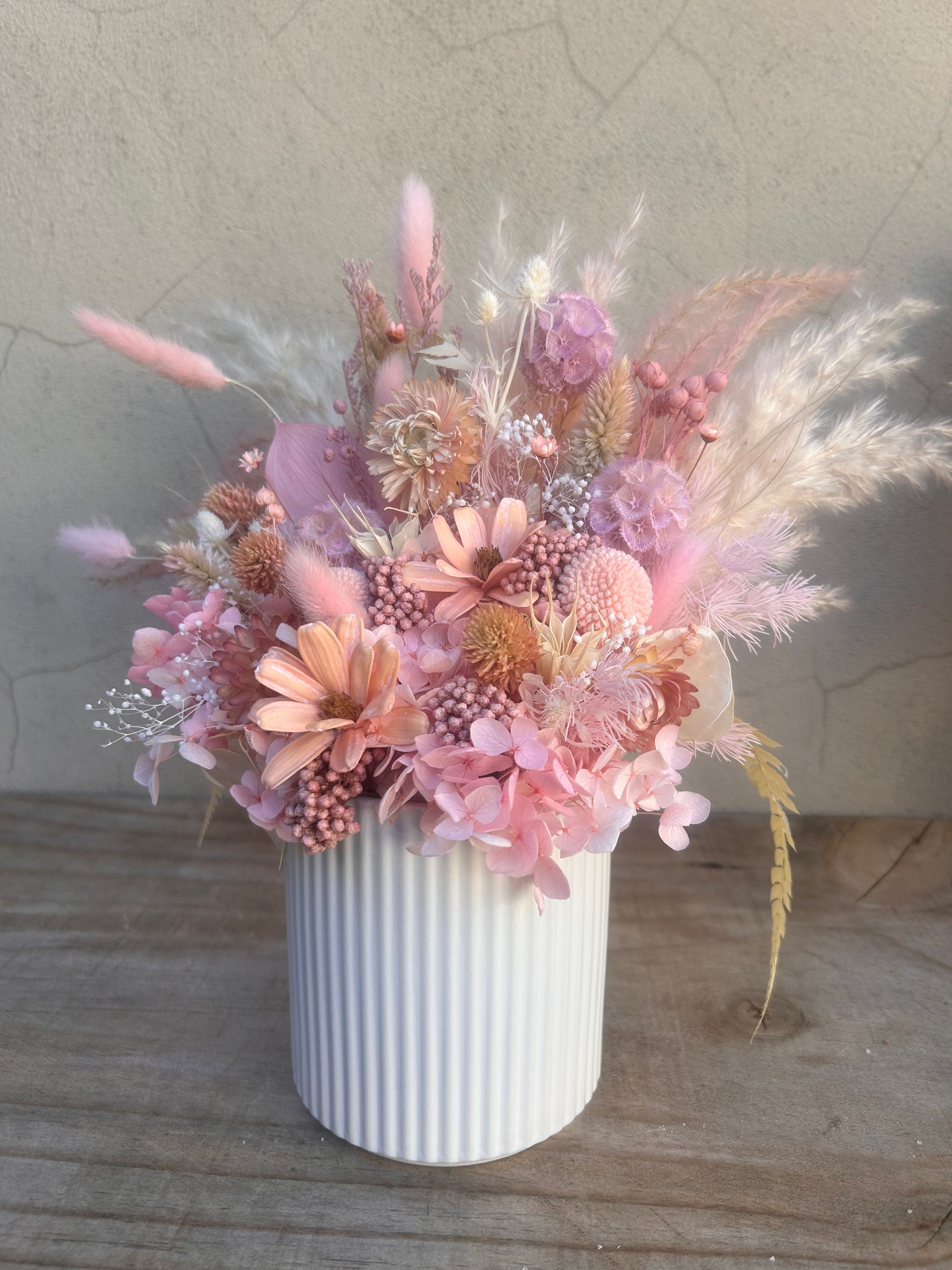 Luxury dried flower arrangement Fairy Floss displayed in modern white ceramic vase, handcrafted in Perth.
