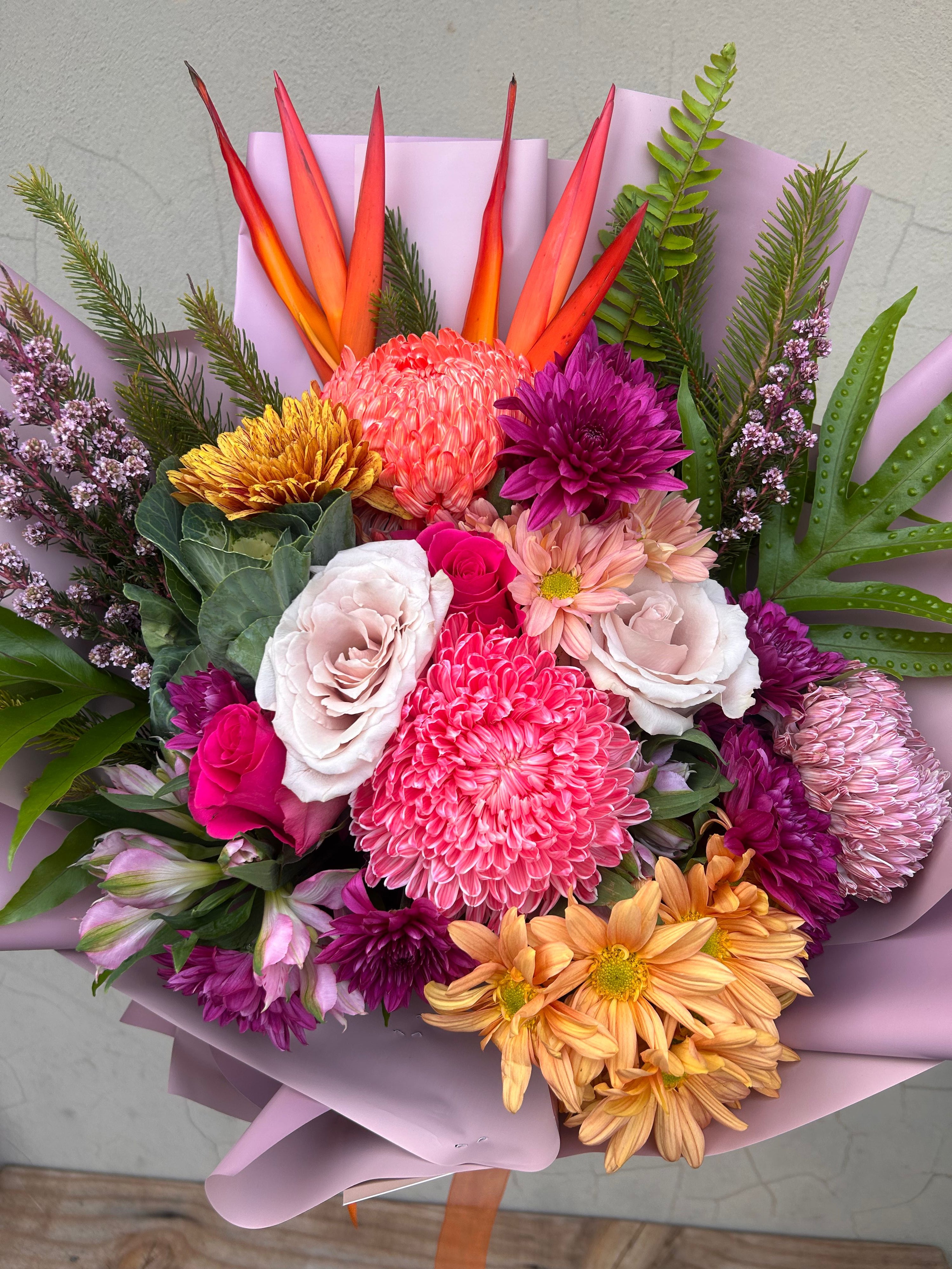 Bright colourful flower bouquet delivery in Perth WA with roses, gerberas and tropical blooms by The Flower Boutique