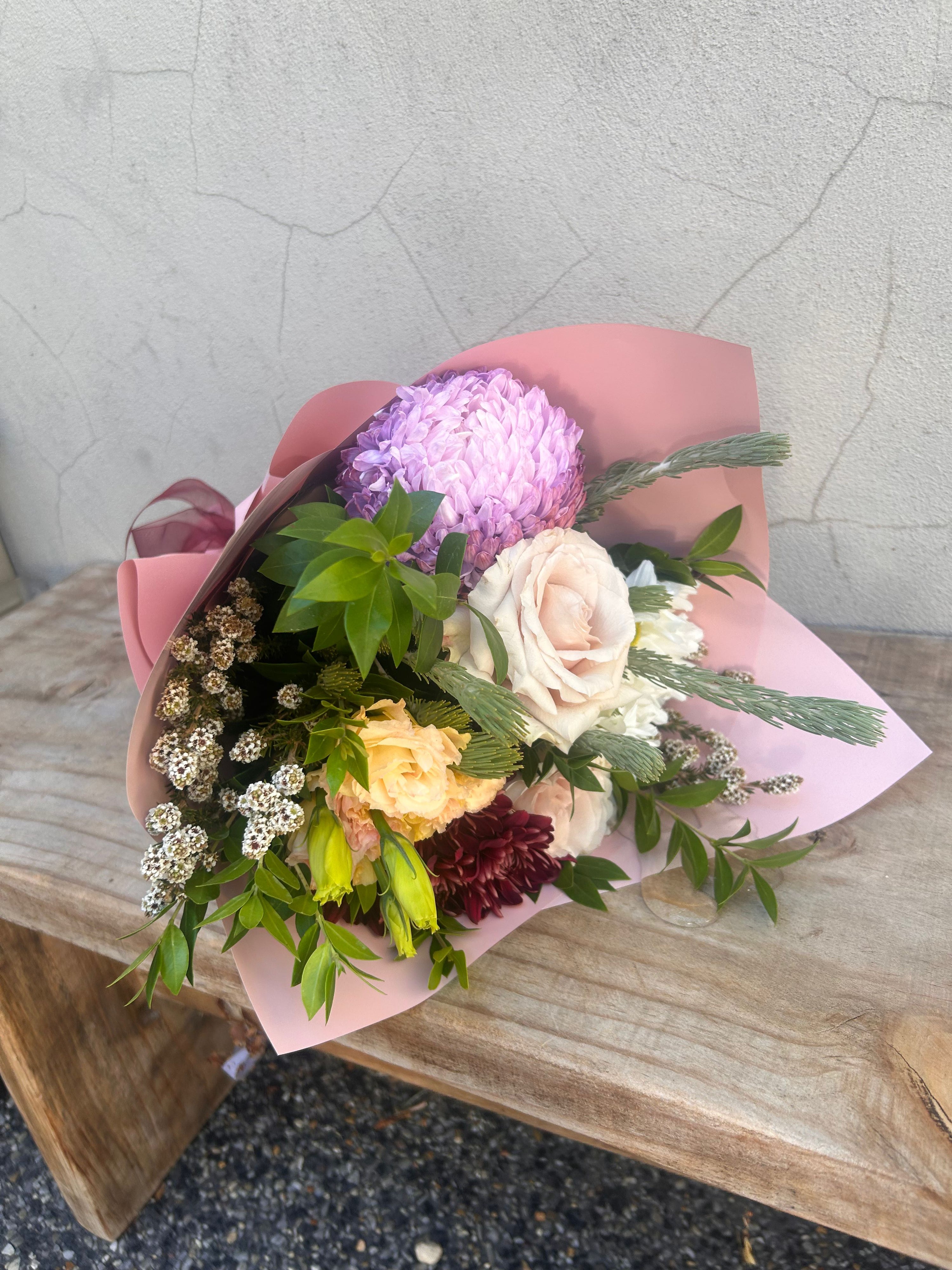 Florist Choice Flower Bouquet featuring a hand-picked selection of seasonal blooms arranged with care for any occasion. Available for same day delivery across Perth W.A 6065