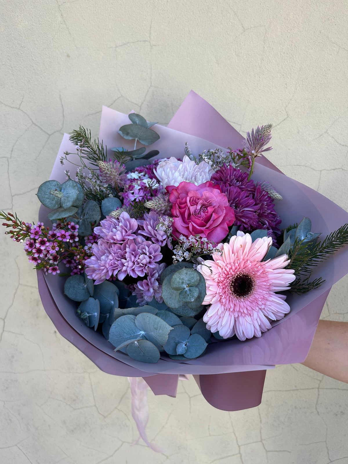 Florist’s Choice bouquet viewed from above, showing mixed seasonal flowers and greenery