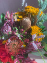 Close-up of native flowers in Christmas Natives Flower Box, Tangerine-coloured Christmas Flower Box available for online order and same day delivery across Perth - florist near me