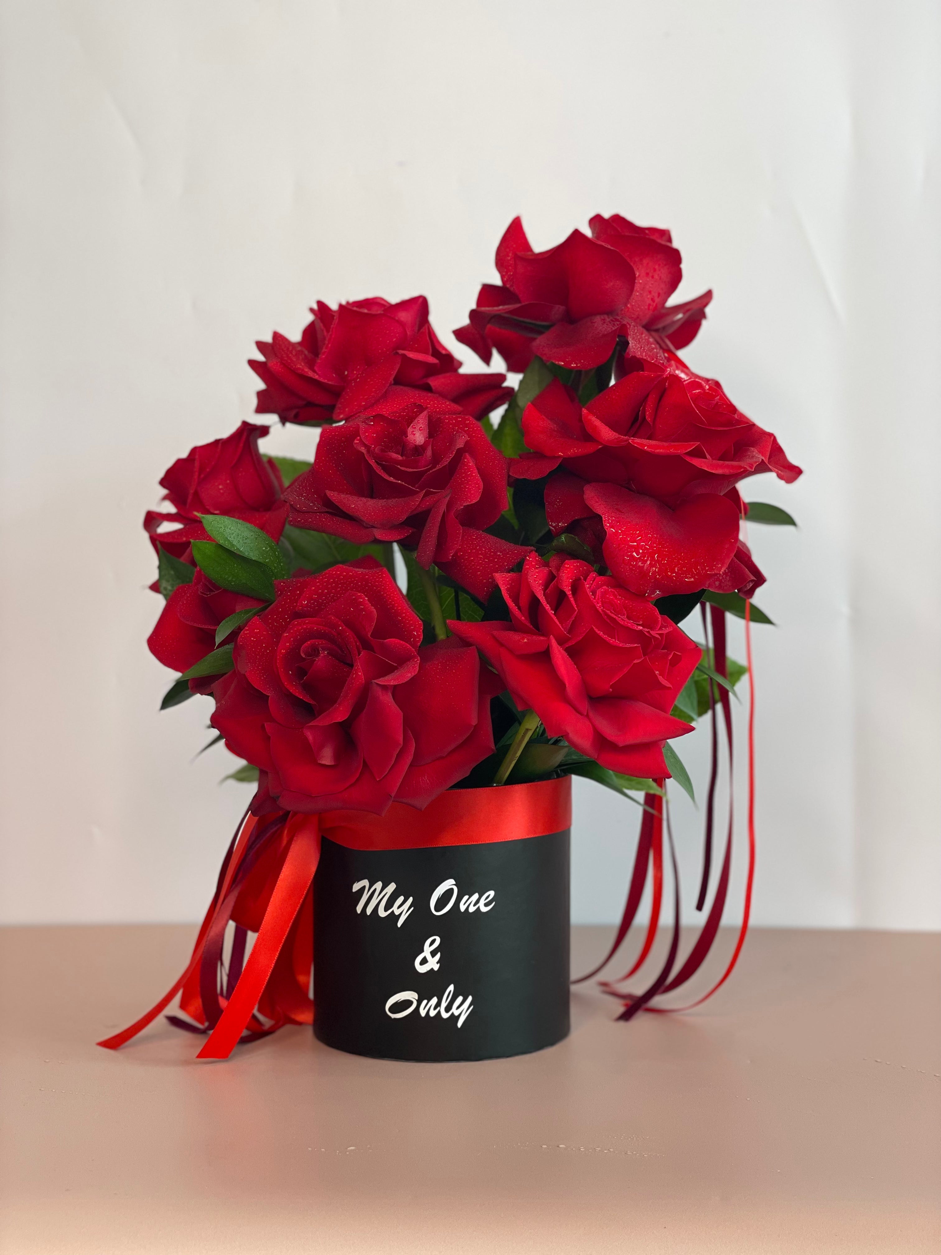 VENUS flower box with "my one & only" written on the box featuring six premium Ecuadorian roses in a black keepsake box.