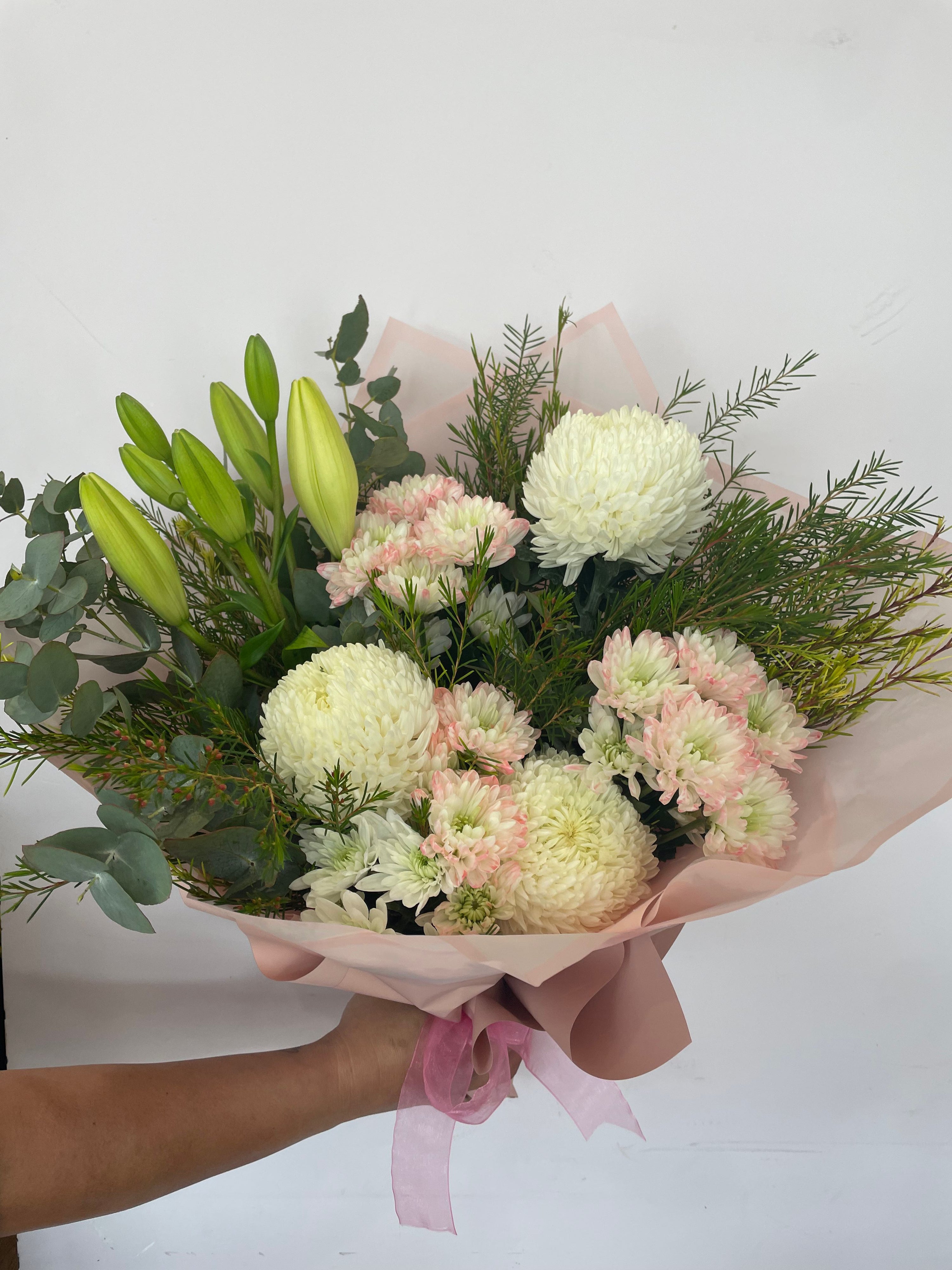 Florist's Choice Flower Bouquet featuring a hand-picked selection of seasonal blooms arranged with care for any occasion. Available for same day delivery across Perth W.A 6065