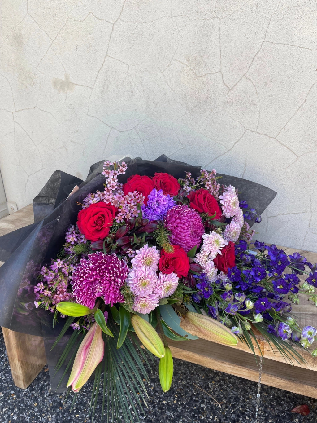 Midnight Velvet bouquet featuring dark berry tones with rich reds, purples, dark pinks, and a touch of blue. Includes roses, dahlias, and lilies, available for delivery in Perth, Western Australia.