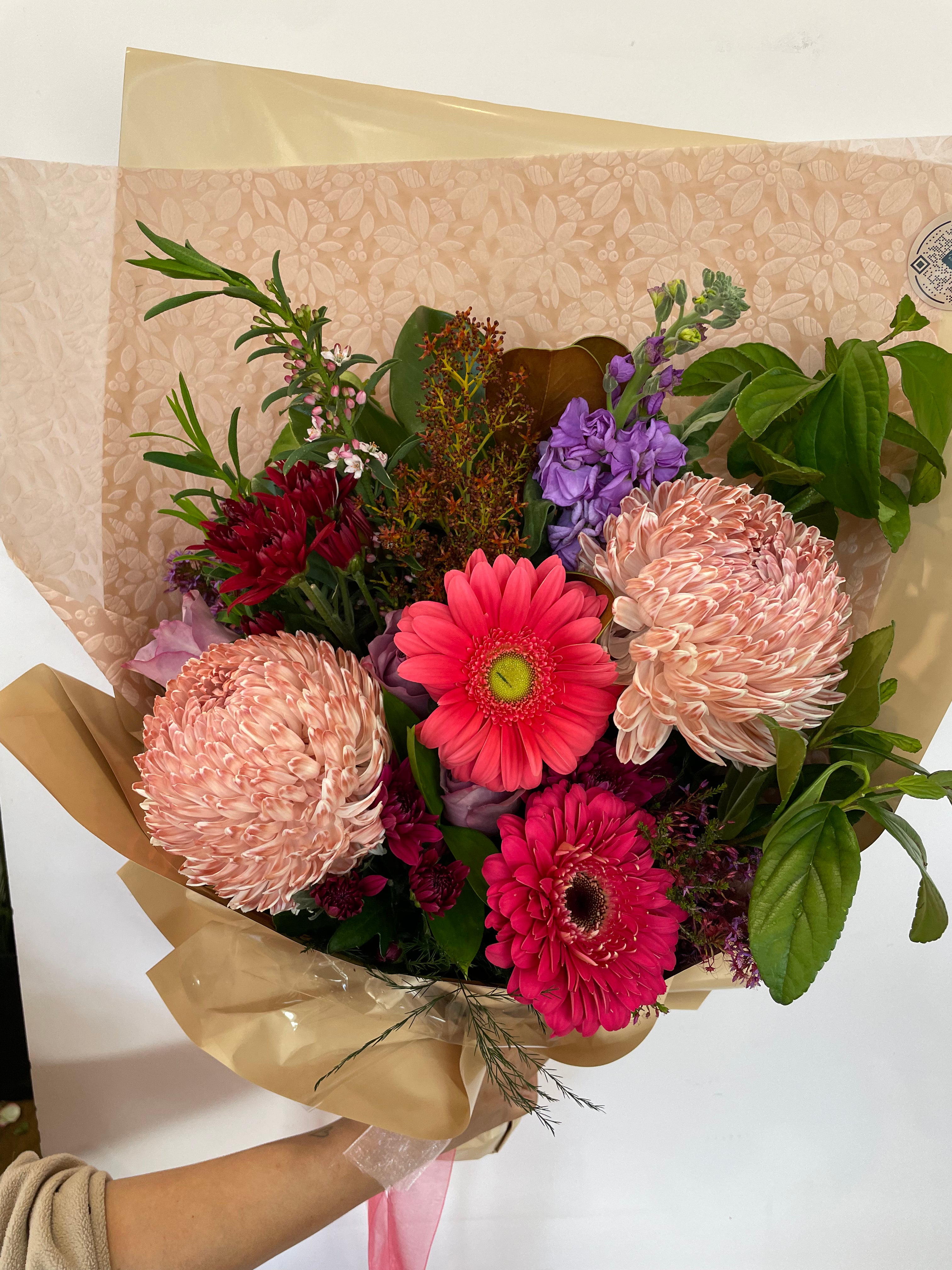 Florist's Choice Flower Bouquet featuring a hand-picked selection of seasonal blooms arranged with care for any occasion. Available for same day delivery across Perth W.A 6065