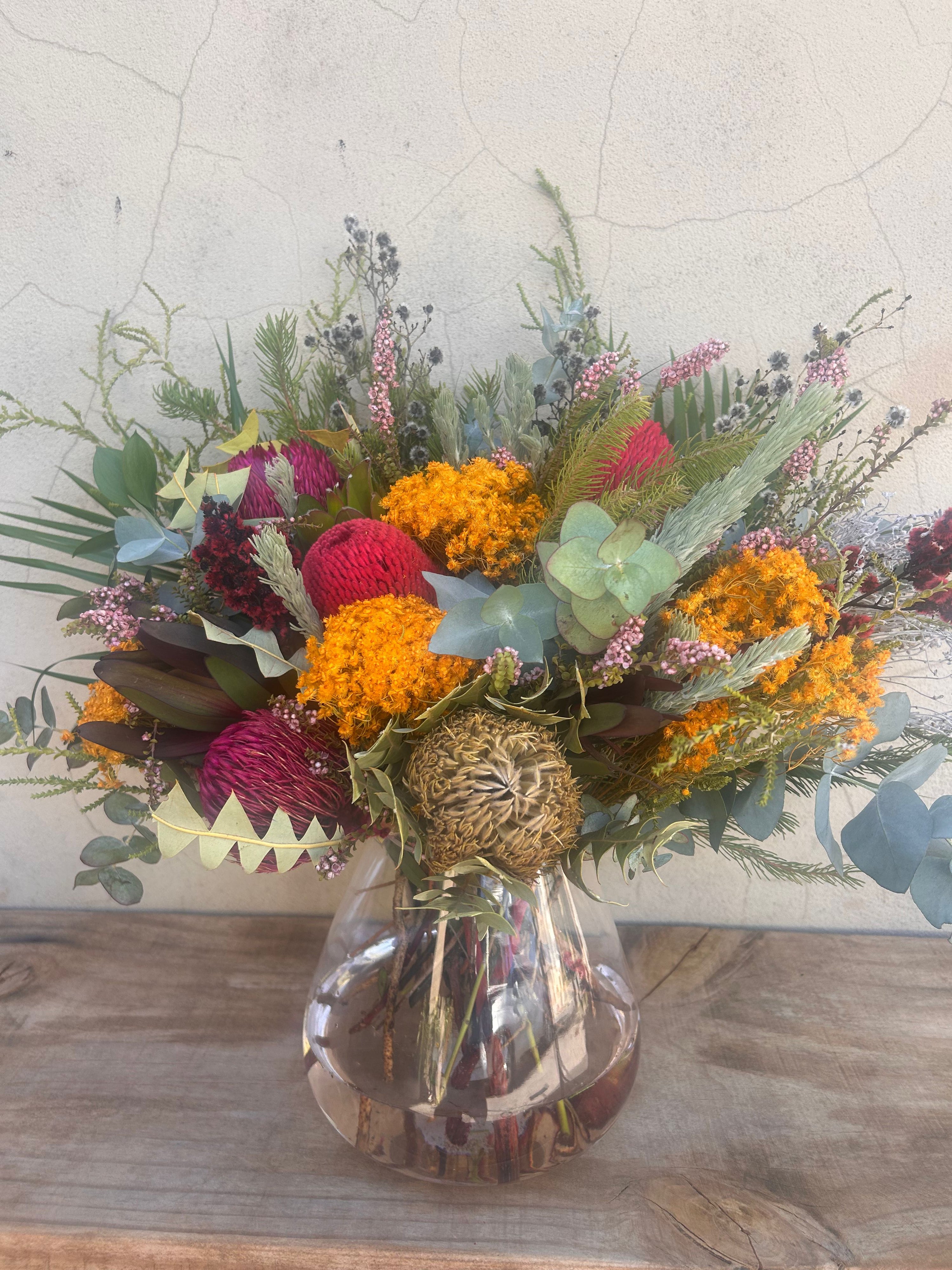 Native flowerrs in a premium vase for our native flower subscription