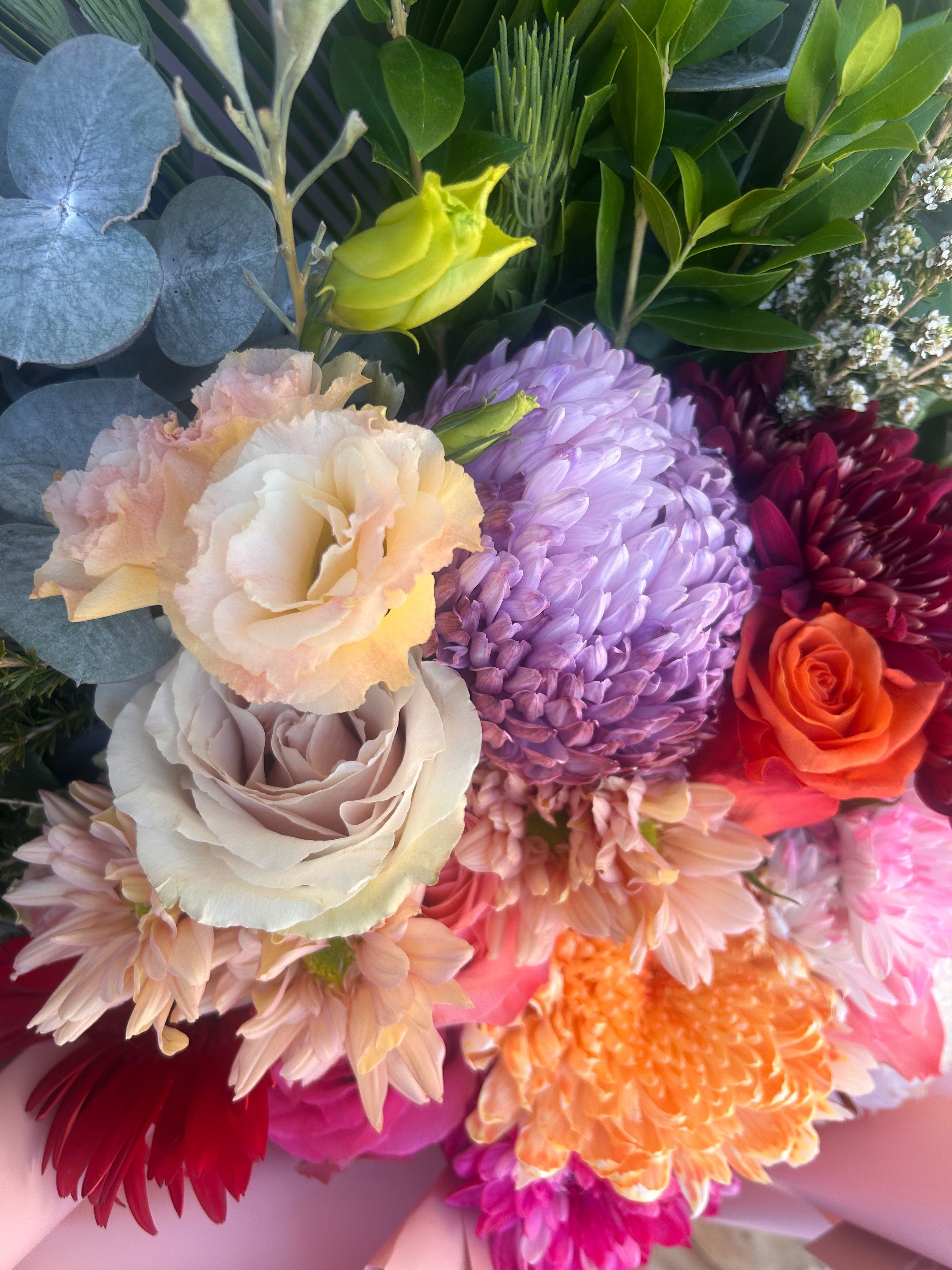 Bright pink bouquet featuring gerberas, daisies and seasonal flowers for same day delivery Perth