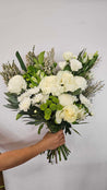 A white neutral coloured bouquet of fresh flowers for same day delivery perth from the Flower Boutique Perth. Popular as sympathy flowers and funeral flowers