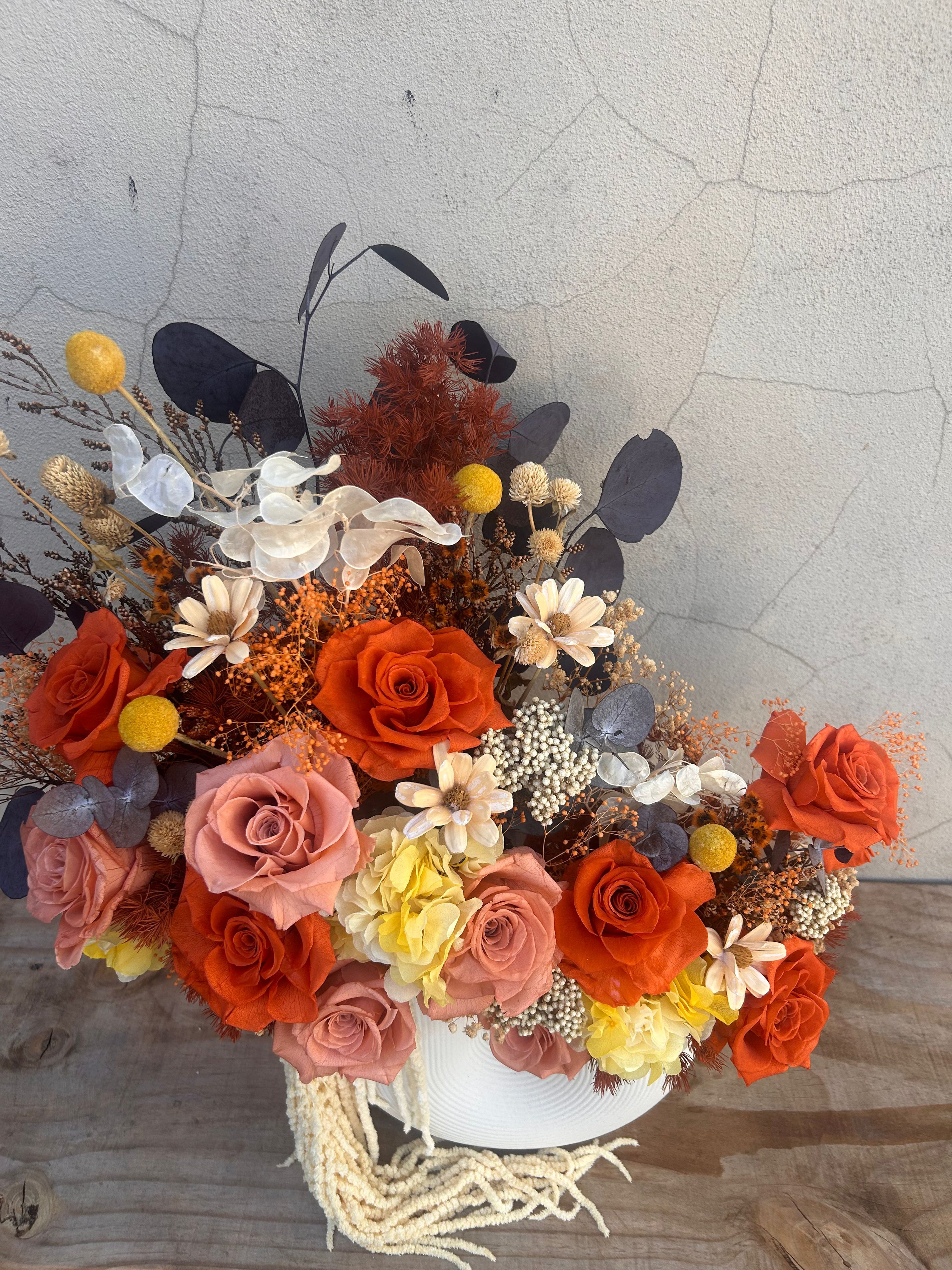 Premium dried floral arrangement in amber and tangerine colours, long lasting home decor piece