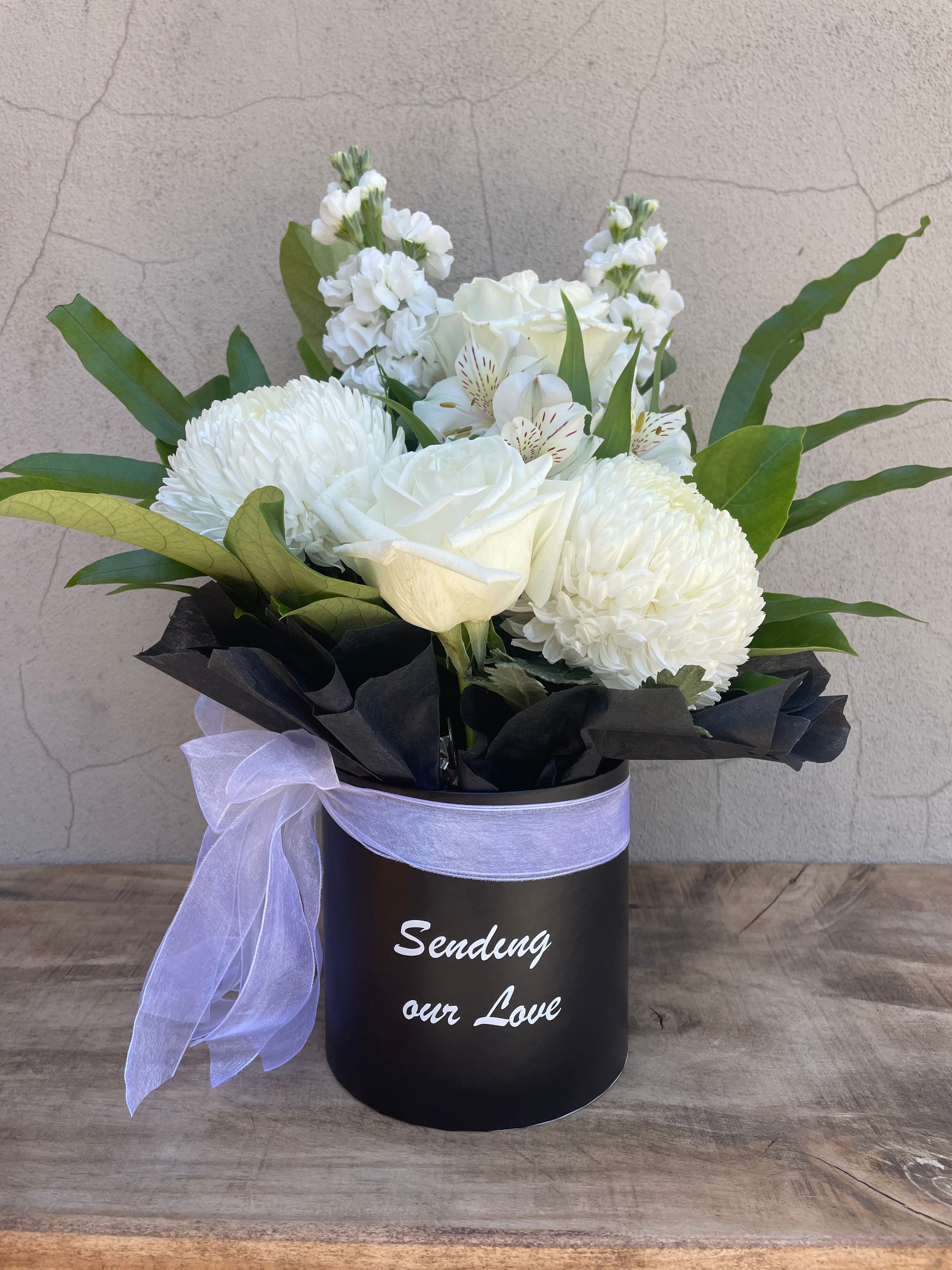 Sympathy flower box available for flower delivery Perth. Ashby florist 
