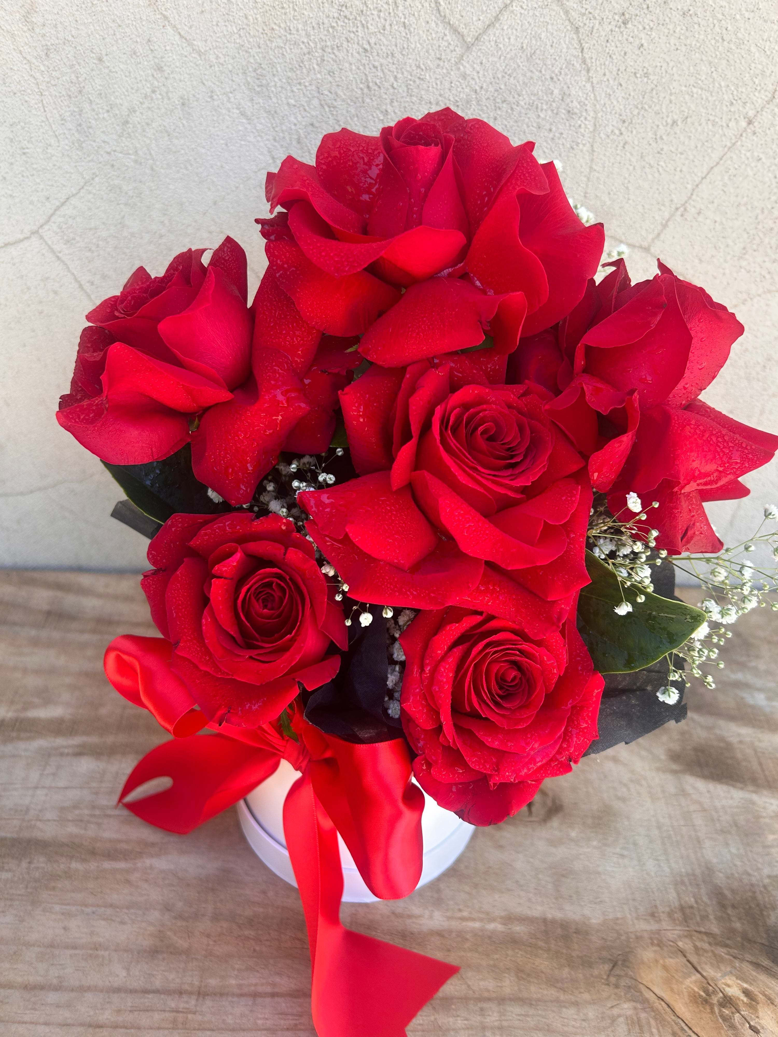 Close-up of red Ecuadorian roses in VENUS Valentine’s Day flower box